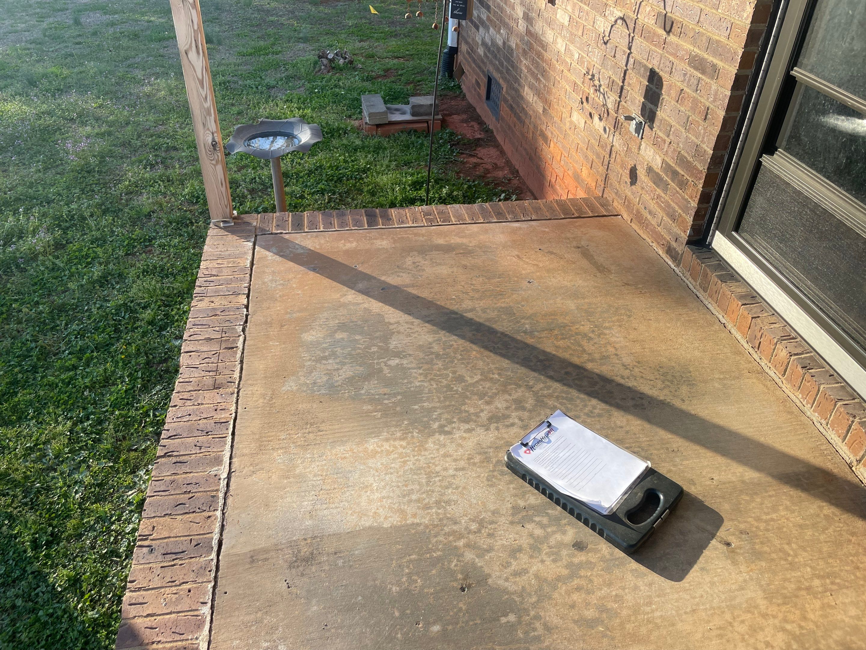 Same slab lifted flush with the brick step after foam injection