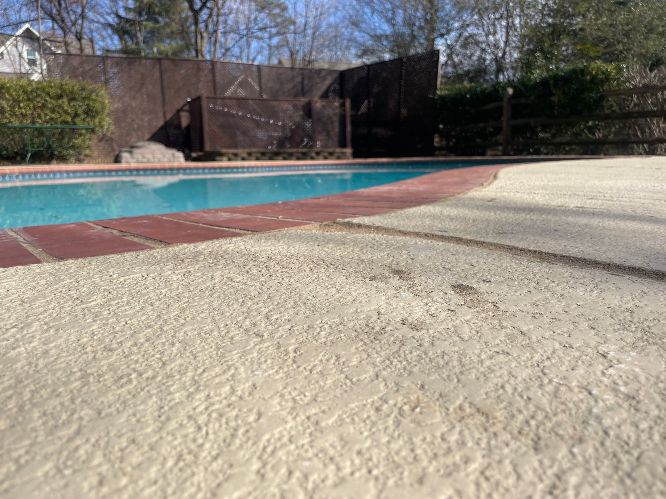 Concrete patio trip hazard between two uneven slabs